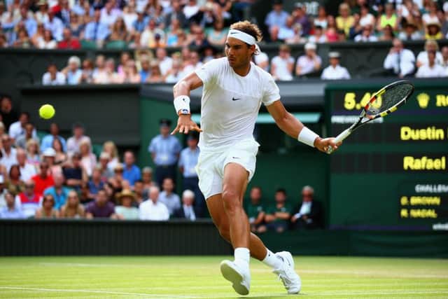 Rafael Nadal of Spain plays a forehand in his second round match against Dustin Brown. Picture: Getty Images