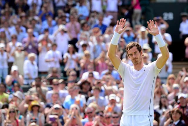 Andy Murray celebrates beating Robin Haase during day four of the Wimbledon Championships. Picture: PA