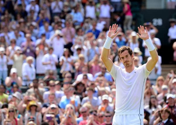 Andy Murray celebrates beating Robin Haase during day four of the Wimbledon Championships. Picture: PA