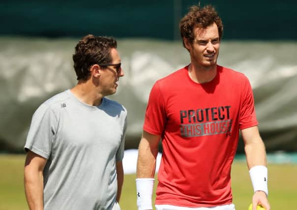 Andy Murray and Jonas Bjorkman (left) during Friday's practice session. Picture: PA