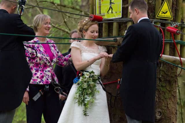 Martyn Milner and Colette Gregory exchange vows amid the tree tops in Aberfoyle, Stirling. Picture: Hemedia