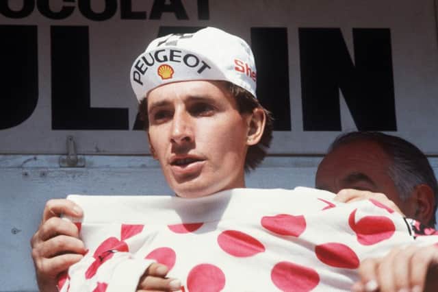 Robert Millar wore the polka dot jersey on the podium in Paris. Picture: AFP