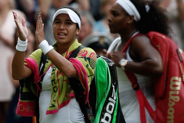 Britain's Heather Watson (L) applauds the crowd as she leaves the court following her defeat to Serena Williams. Picture: AFP/Getty