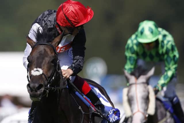 Frankie Dettori, riding Golden Horn, looks around for any danger before winning the Coral-Eclipse. Picture: Getty