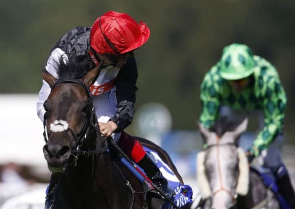 Frankie Dettori, riding Golden Horn, looks around for any danger before winning the Coral-Eclipse. Picture: Getty