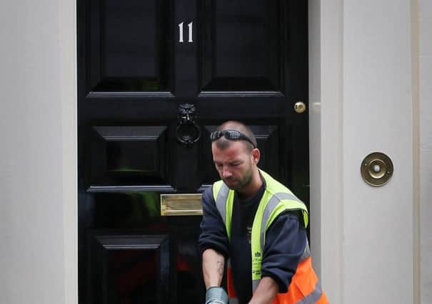Many low-paid workers effectively pay George Osborne 100% of any additional income they earn. Picture: Getty