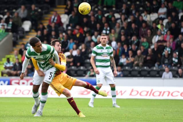 Celtic defender Virgil van Dijk scores with a header to pull a goal back in the 5-3 defeat by Dukla Prague. Picture: SNS