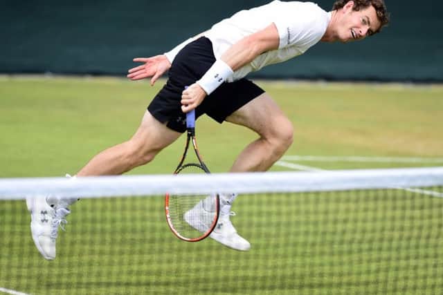Andy Murrays practice session yesterday was aimed at matching the power and "kick" of Ivo Karlovics serve. Picture: PA