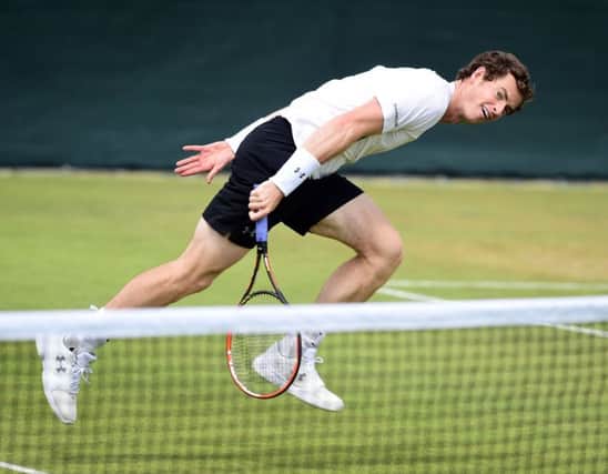 Andy Murrays practice session yesterday was aimed at matching the power and "kick" of Ivo Karlovics serve. Picture: PA
