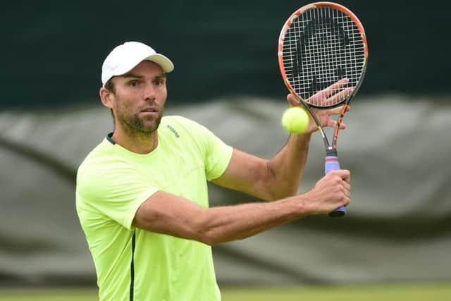 Ivo Karlovic: Croat is 6ft 11in. Picture: PA