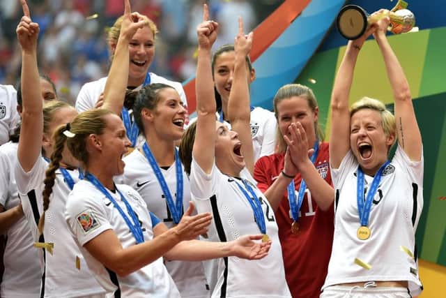 Megan Rapinoe lifts the trophy after winning the FIFA Women's World Cup. Picture: Getty