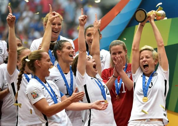 Megan Rapinoe lifts the trophy after winning the FIFA Women's World Cup. Picture: Getty