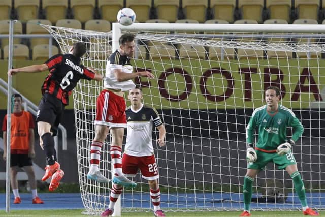 The Dons were unhappy with the home support in Skopje after goalkeeper Danny Ward had a laser shone in his eyes. Picture: AP