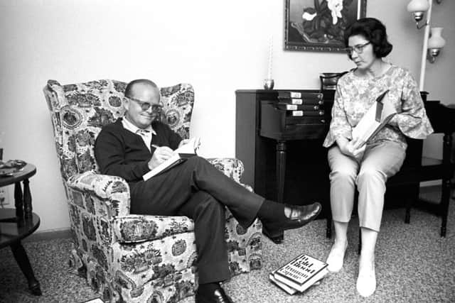 Truman Capote signing copies of his book In Cold Blood, with Harper Lee. Picture: Steve Schapiro
