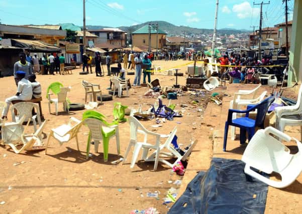The scene in Jos where twin bomb blasts the day before killed at least 44 people. Picture: AFP/Getty
