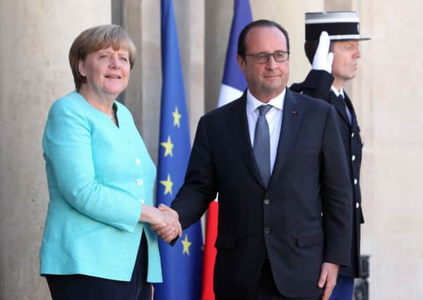 Angela Merkel meets for talks with French President Francois Hollande about the Greek crisis. Picture: AP