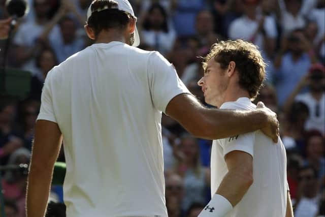 Karlovic congratulates Murray after the game. Picture: AP