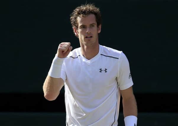 Andy Murray is through to the quarter-finals after defeating Ivo Karlovic. Picture: PA