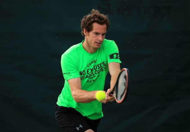 The T-shirt worn by Andy Murray in practice yesterday says no excuses, but so far he has not needed any. Picture: PA