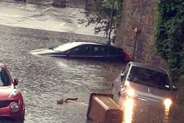 Cars are caught in flash flooding on Polmuir Road in Aberdeen after torrential rain hit the city. Picture: Hemedia