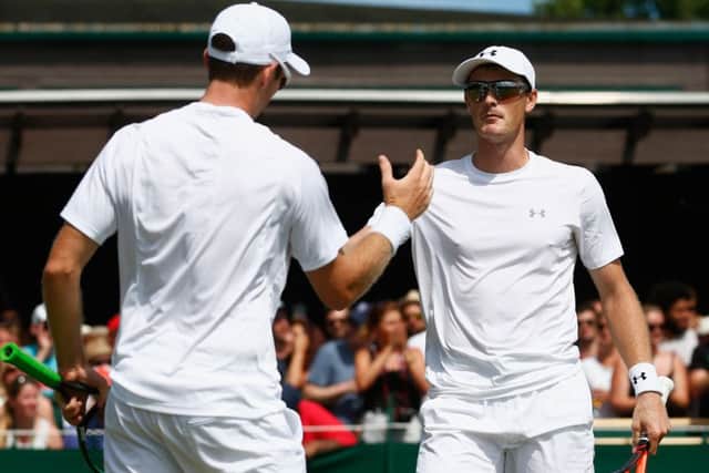 Jamie Murray, right, and partner John Peers of Australia celebrate their win. Picture: Getty