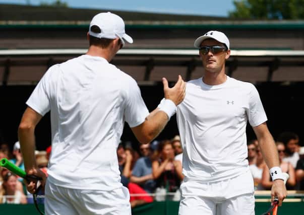 Jamie Murray, right, and partner John Peers of Australia celebrate their win. Picture: Getty