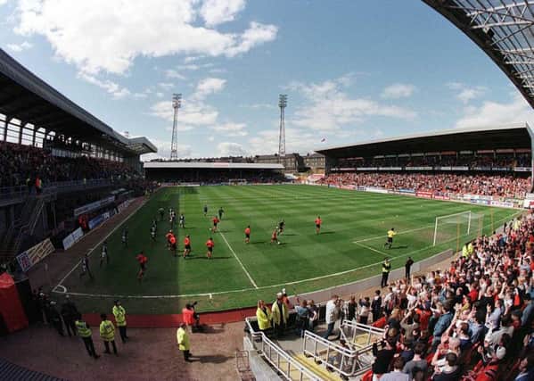 Five Aberdeen supporters are in court over allegedly causing 'widespread disruption' at a Dundee United fixture. Picture: SNS
