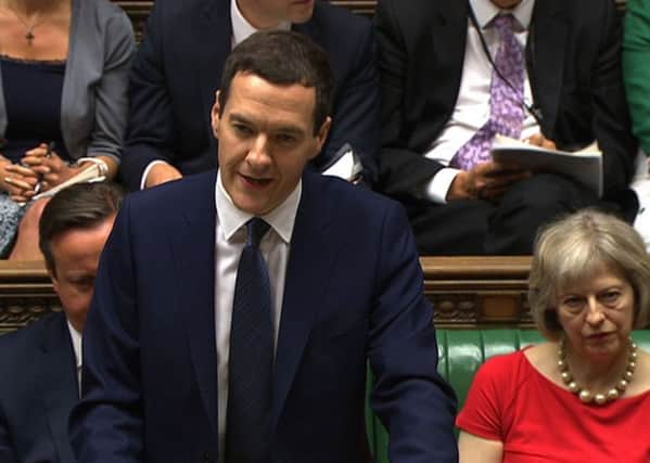 George Osborne delivers his Budget statement to the House of Commons. Picture: Getty Images/AFP