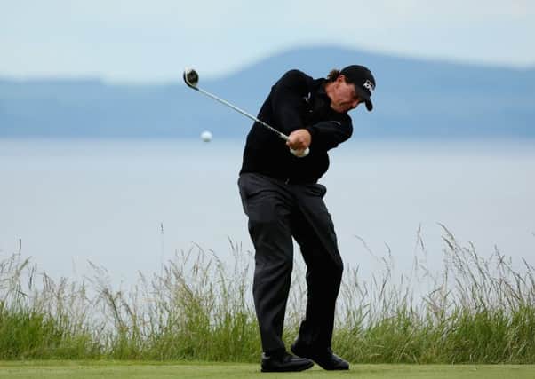 Phil Mickelson hits his tee shot on the ninth hole during yesterdays proam at Gullane. Picture: Mike Ehrmann/Getty