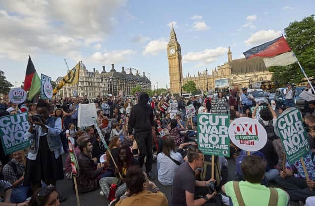 Protestors take part in a demonstration in central London ahead of George Osborne's budget. Picture: Getty