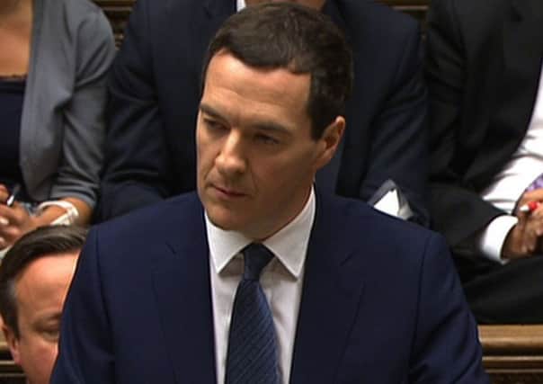 George Osborne delivering his budget speech to the House of Commons. Picture: AFP/Getty
