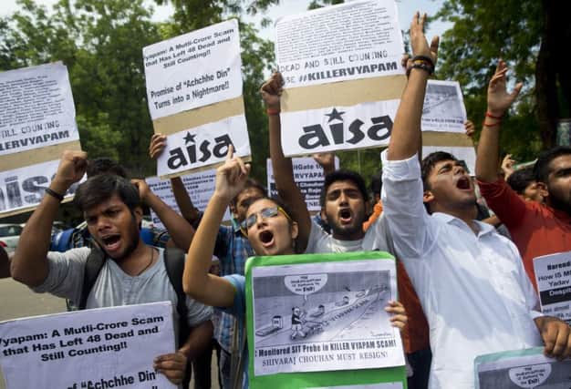 Left-wing students protest against the scam. Picture: AP