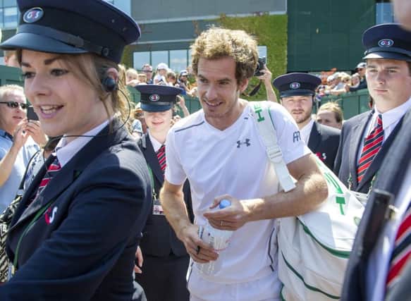 Andy Murray looked relaxed arriving at Wimbledons Court 15 yesterday for his practice session. Picture: Ian Rutherford