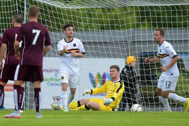 Kevin Cawley (3rd from left) celebrates after scoring Dumbarton's second goal. Picture: SNS