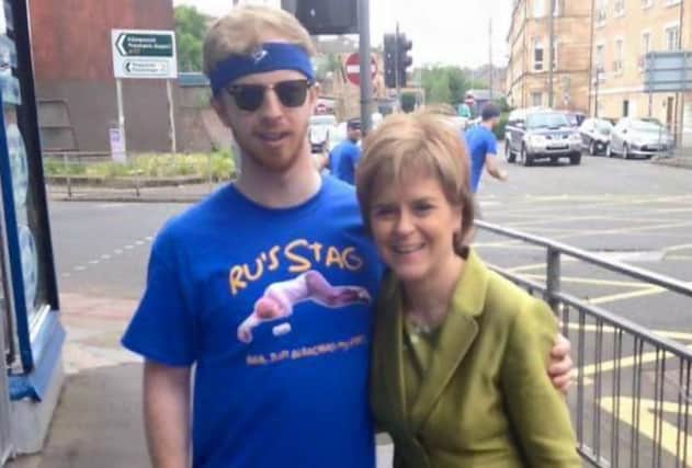 Nicola Sturgeon was only too happy to pose for photos with the stag party. Picture: Twitter/TobiWilson56