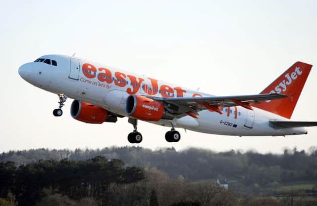 A singer in a boyband vomited and collapsed on a flight from London to Glasgow after an unusual attempt to avoid an extra baggage fee with airliner easyJet. Picture: PA