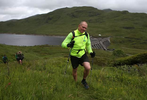 Former rugby player Mike Tindall takes part in the Artemis Great Kindrochit Quadrathlon. Picture: PA