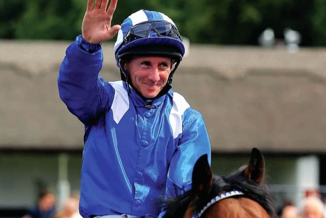 Jockey Paul Hanagan celebrates after winning The Darley July Cup on Muhaarar. Picture: PA