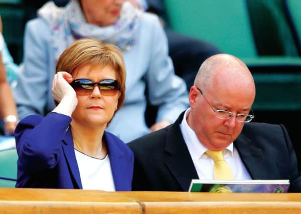 Nicola Sturgeon adjusts her sunglasses for a better view of the match lost by Jamie. Picture: Getty Images