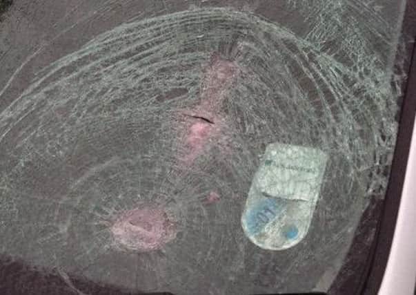 The cracked windscreen which was smashed by a bottle thrown from an overpass. Picture: Contributed