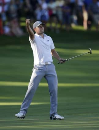 Jordan Spieth celebrates a birdie at the John Deere Classic, but would he have been better advised to play in Gullane? Picture: AP