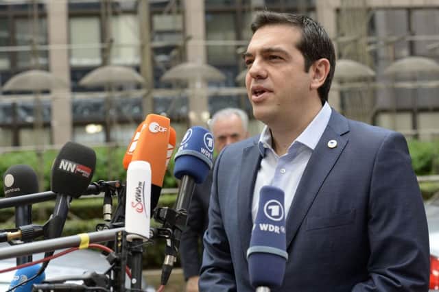 Greek PM Alexis Tsipras will need to put tough reforms into law by Wednesday. Picture: AFP/Getty Images