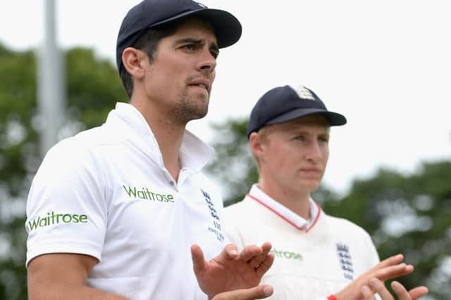 Alastair Cook with Joe Root after Englands victory over Australia in four days at Cardiff. Picture: Getty