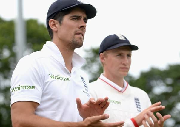 Alastair Cook with Joe Root after Englands victory over Australia in four days at Cardiff. Picture: Getty