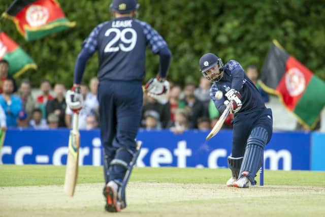 Preston Mommsen goes for a big hit but his 44 was not enough to save Scotland. Picture: Donald MacLeod