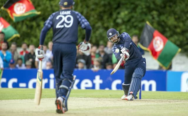 Preston Mommsen goes for a big hit but his 44 was not enough to save Scotland. Picture: Donald MacLeod