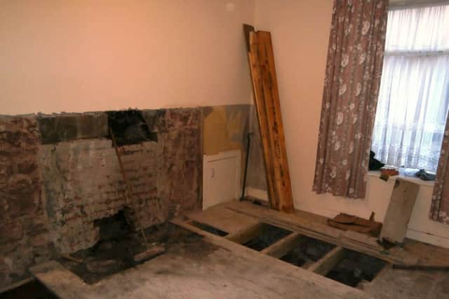 This image of an Arbroath home was taken before its successful renovation, seen above. Picture: Shelter Scotland