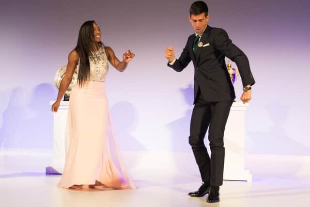 Serena and Novak strut their stuff, although he was the less awkward of the two champions. Picture: AFP/Getty