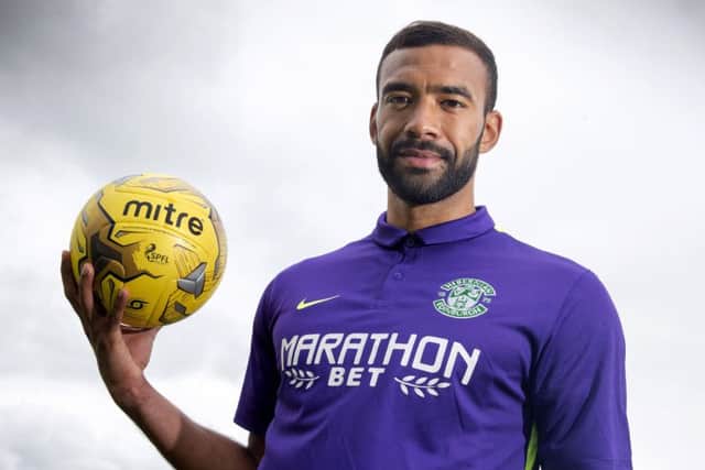 Hibernian defender Liam Fontaine unveils the club's new away kit. Picture: SNS