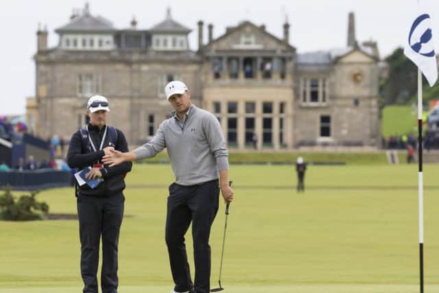 Jordan Spieth gets a feel for the first green on the Old Course during his practice round at St Andrews yesterday. Picture: AP